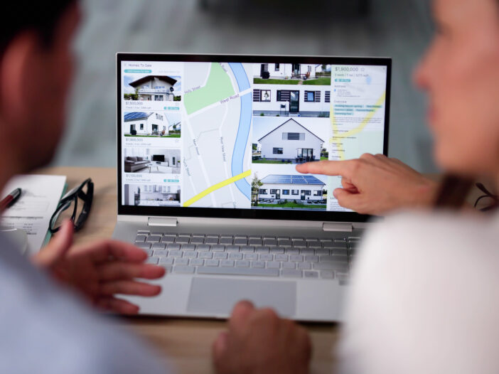 Couple Family Searching Real Estate Online